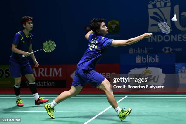 Du Yue and Li Yinhui of China compete against Hsu Ya Ching and Wu Ti Jung of Chinese Taipei during the Women's Doubles Round 2 match on day three of...