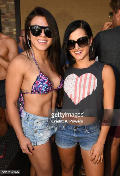 Strawweight Claudia Gadelha and television personality Megan Olivi attend a UFC Pool Party on July 4, 2018 at the Hard Rock Hotel & Casino in Las...