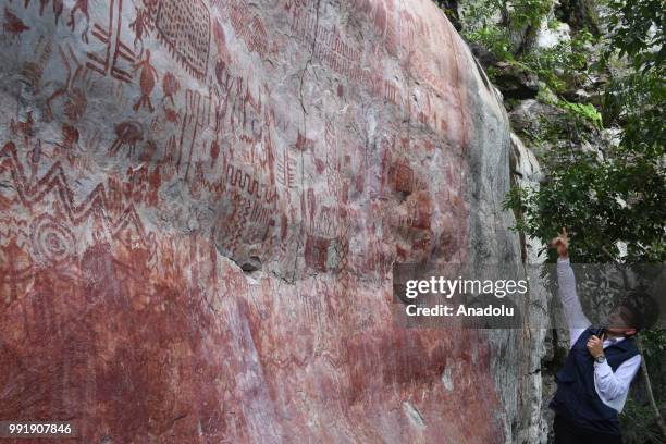 The ancient rock art, that depicting animals and humans, is seen at the Chiribiquete National Park in Guaviare, Cerro Azul, Colombia on July 02,...