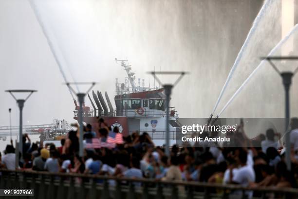 Fire boat puts on a water show during the Independence Day celebrations at the East River in New York, United States on July 4, 2018.