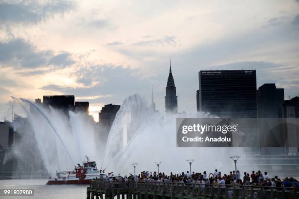 Fire boat puts on a water show during the Independence Day celebrations at the East River in New York, United States on July 4, 2018.