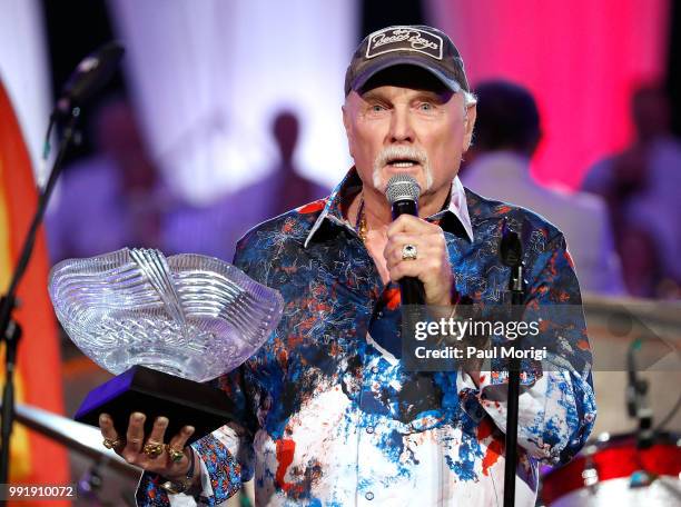 Mike Love of The Beach Boys receives the National Artistic Achievement award at the 2018 A Capitol Fourth at the U.S. Capitol, West Lawn on July 4,...