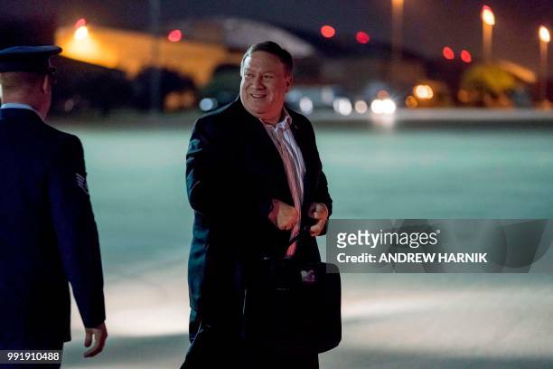 Secretary of State Mike Pompeo boards his plane at Andrews Air Force Base in Maryland on July 5 to travel to Anchorage, Alaska on his way to...