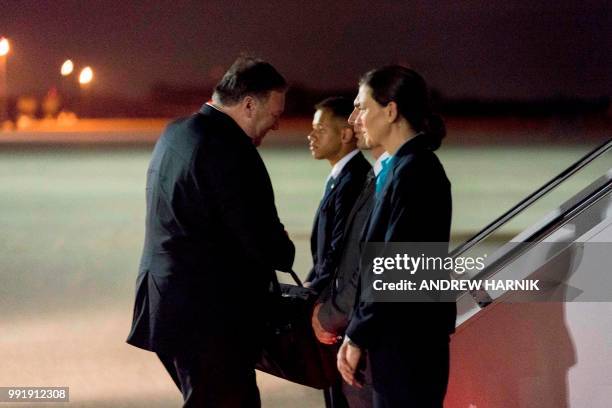 Secretary of State Mike Pompeo boards his plane at Andrews Air Force Base in Maryland on July 5 to travel to Anchorage, Alaska on his way to...