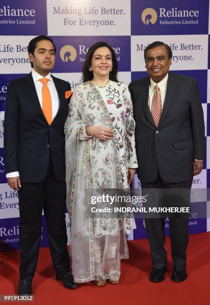 India's richest man and oil-to-telecom conglomerate Reliance Industries chairman Mukesh Ambani along with his wife Nita Ambani and their son Anant...