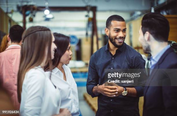 business people at a conference meeting - exhibition stock pictures, royalty-free photos & images