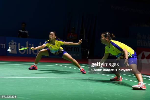 Chow Mei Kuan and Lee Meng Yean of Malaysia compete against Chen Qingchen and Jia Yifan of China during the Women's Doubles Round 2 match on day...