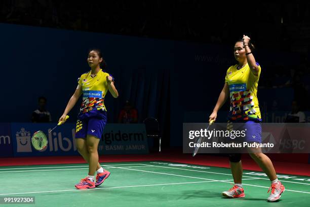 Chow Mei Kuan and Lee Meng Yean of Malaysia compete against Chen Qingchen and Jia Yifan of China during the Women's Doubles Round 2 match on day...