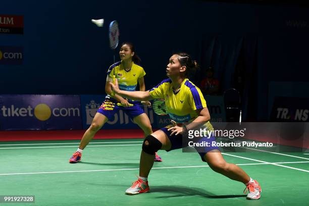 Chow Mei Kuan and Lee Meng Yean of Malaysia compete against Chen Qingchen and Jia Yifan of China during the Women's Doubles Round 2 match on day...