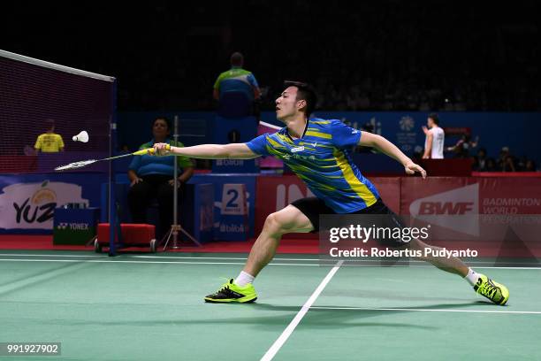 Wang Tzu Wei of Chinese Taipei competes against Prannoy H.S. Of India during the Men's Singles Round 2 match on day three of the Blibli Indonesia...