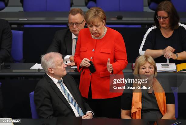 German Chancellor and leader of the German Christian Democratic Union Angela Merkel and Interior Minister and leader of the CDU sister party, the...