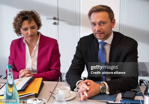 Leader of the liberal Free Democratic Party of Germany Christian Lindner and FDP general secretary Nicola Beer sitting at the start of FDP Presidium...