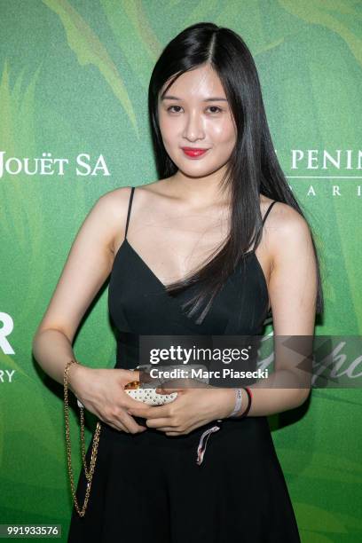 Guest attends the amfAR Paris Dinner 2018 at The Peninsula Hotel on July 4, 2018 in Paris, France.