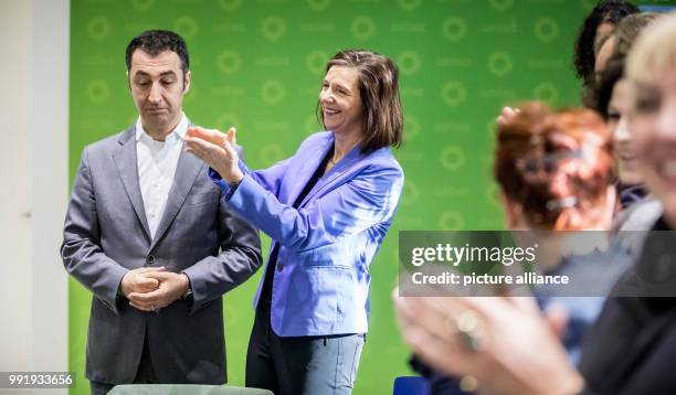 The Greens party whip in the Bundestag, Katrin Goering-Eckardt , stands next to the federal chairman of the Greens, Cem Ozdemir, before meeting of...