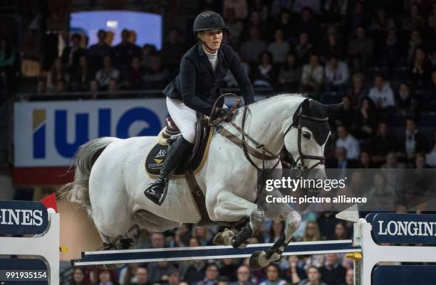 Norwegian show jumper Marit Haarr Skollerud on horse Nicole in action at the Grand Prix of Stuttgart of the FEI World Cup equestrian competition in...