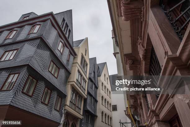 Houses with reconstructed historic fronts line along the narrow streets and alleyways in the old town centre of Frankfurt, Germany, 20 November 2017....