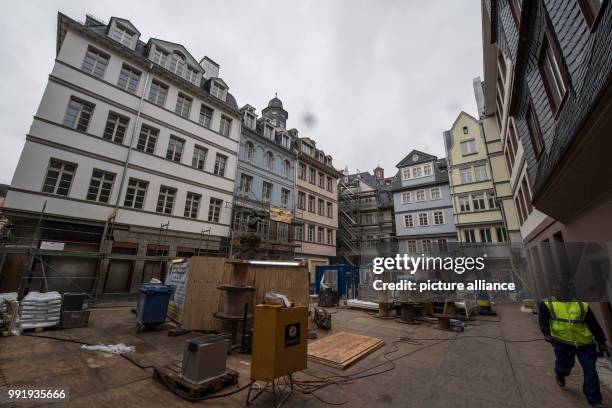 Houses with reconstructed historic fronts frame a historic market square in the old town centre of Frankfurt, Germany, 20 November 2017. After the...