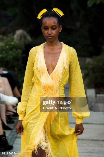 Model runs the runway during the Marcel Ostertag fashion show during the Mercedes Benz Berlin Fashion Week Spring/Summer 2019 in Berlin, Germany on...