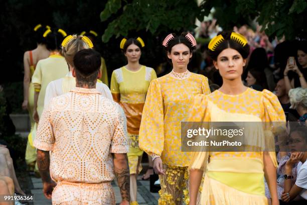 Models run the runway during the Marcel Ostertag fashion show during the Mercedes Benz Berlin Fashion Week Spring/Summer 2019 in Berlin, Germany on...