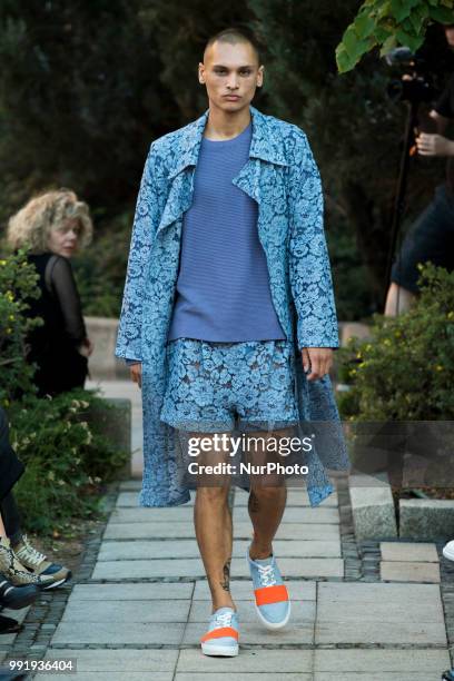 Model runs the runway during the Marcel Ostertag fashion show during the Mercedes Benz Berlin Fashion Week Spring/Summer 2019 in Berlin, Germany on...