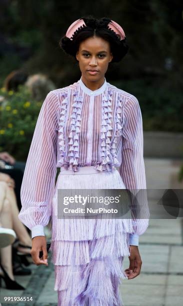 Model runs the runway during the Marcel Ostertag fashion show during the Mercedes Benz Berlin Fashion Week Spring/Summer 2019 in Berlin, Germany on...