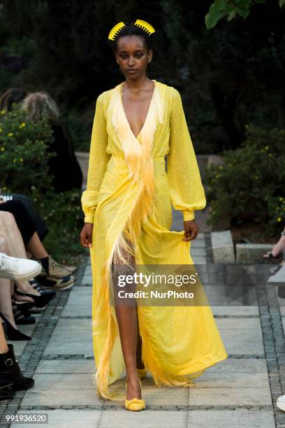 Model runs the runway during the Marcel Ostertag fashion show during the Mercedes Benz Berlin Fashion Week Spring/Summer 2019 in Berlin, Germany on...