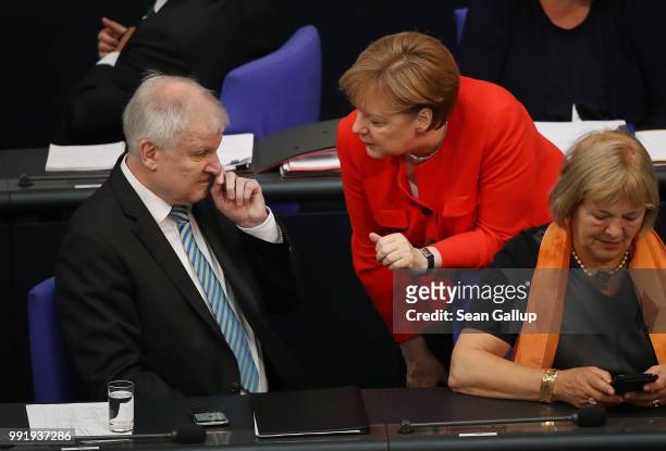 German Chancellor and leader of the German Christian Democratic Union Angela Merkel and Interior Minister and leader of the CDU sister party, the...