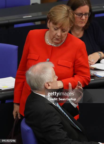 German Chancellor and leader of the German Christian Democratic Union Angela Merkel and Interior Minister and leader of the CDU sister party, the...