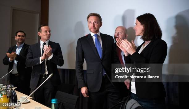 Chairman of the Free Democratic Party , Christian Lindner , stands beside vice chairwoman Katja Suding as well as FDP board members Michael Alexander...