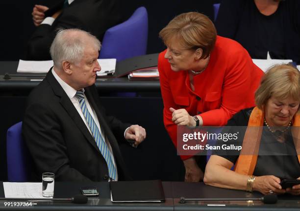 German Chancellor and leader of the German Christian Democratic Union Angela Merkel and Interior Minister and leader of the CDU sister party, the...