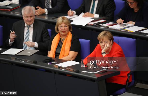 German Chancellor and leader of the German Christian Democratic Union Angela Merkel and Interior Minister and leader of the CDU sister party, the...