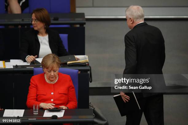 German Interior Minister and leader of the Bavarian Social Union , Horst Seehofer, sits down after speaking at the last session of the Bundestag...