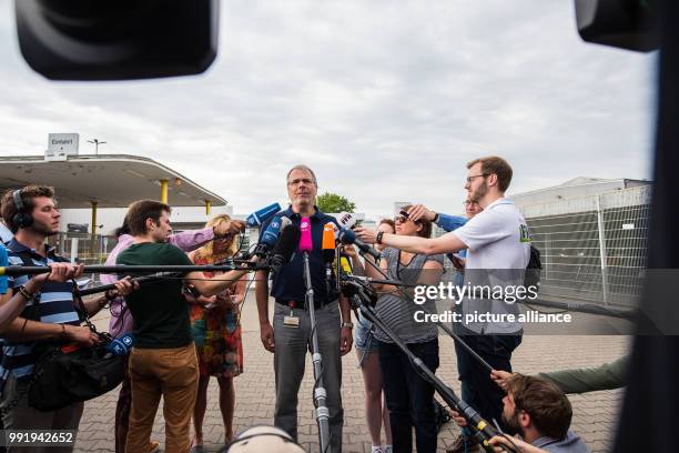 July 2018, Ruesselsheim, Germany: Wolfgang Schaefer-Klug, chairman of the works council at the Opel headquarters speaks on the rumors concerning a...