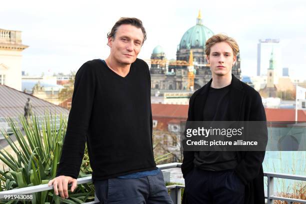 The actors Oliver Masucci and Louis Hofmann stand beside each other during a photoshoot for the European premiere of the Netflix series "Dark" in...