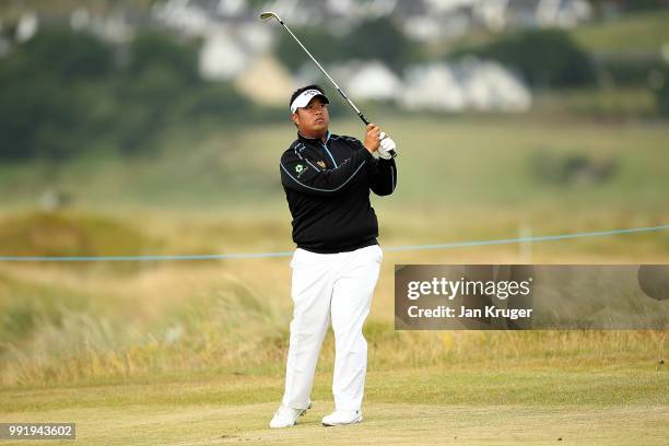 Kiradech Aphibarnrat of Thailand plays his second shot on the 10th hole during day one of the Dubai Duty Free Irish Open at Ballyliffin Golf Club on...