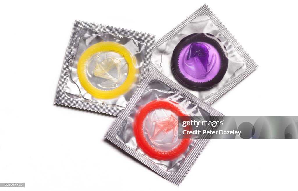 Three coloured condoms