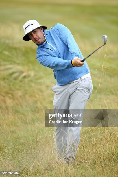 Ryan Evans of England plays his second shot on the 10th hole during day one of the Dubai Duty Free Irish Open at Ballyliffin Golf Club on July 5,...