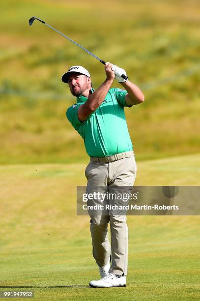 Graeme McDowell of Northern Ireland plays his second shot on the 16th hole during day one of the Dubai Duty Free Irish Open at Ballyliffin Golf Club...