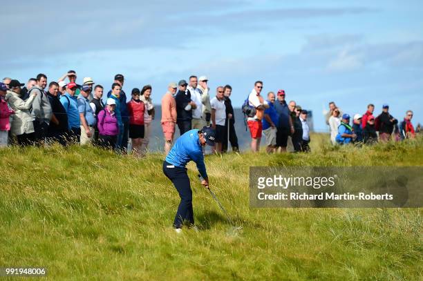 Rafa Cabrera Bello of Spain plays his second shot on the 15th hole during day one of the Dubai Duty Free Irish Open at Ballyliffin Golf Club on July...