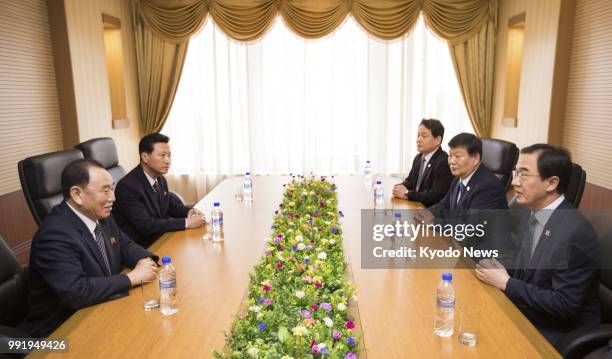 South Korean Unification Minister Cho Myoung Gyon and North Korea's Kim Yong Chol , vice chairman of the Central Committee of the Workers' Party of...
