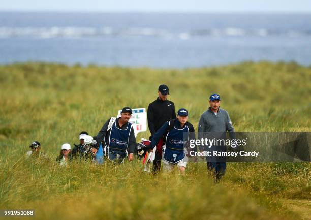 Donegal , Ireland - 5 July 2018; Padraig Harrington of Ireland and his caddy, Ronan Flood, make their way to the 13th fairway during Day One of the...