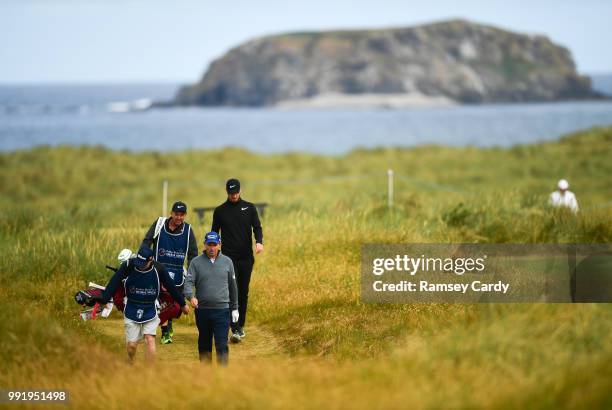 Donegal , Ireland - 5 July 2018; Padraig Harrington of Ireland and his caddy, Ronan Flood, make their way to the 13th fairway during Day One of the...