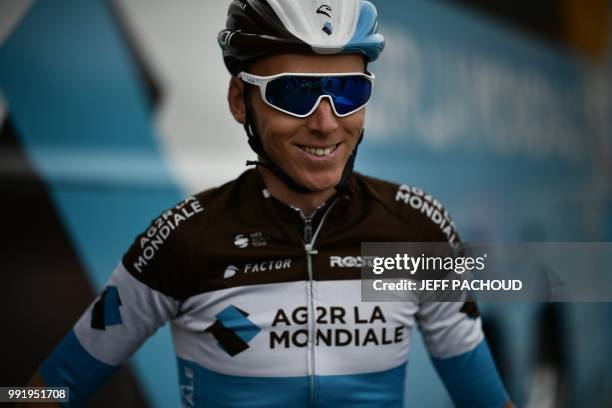 France's Romain Bardet prepares to depart for a training session on July 5, 2018 in Mouilleron-le-Captif, western France, two days prior to the start...