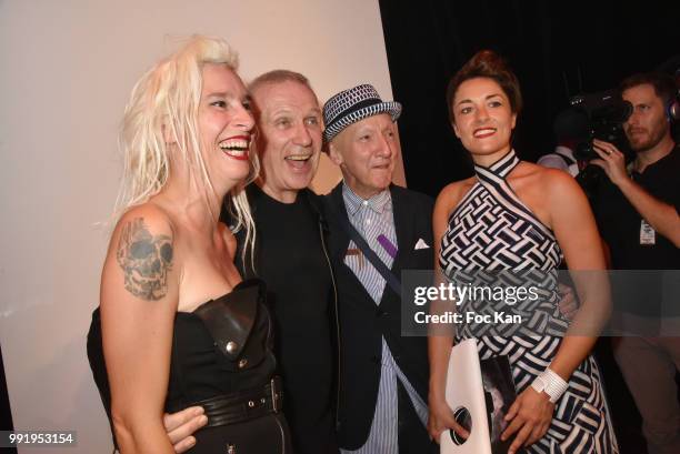 Guest, Jean Paul Gaultier, hat designer Stephen Jones and ta guest attend the Jean-Paul Gaultier Haute Couture Fall Winter 2018/2019 show as part of...