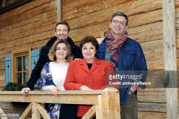The actors Heiko Ruprecht , Ronja Forcher, Monika Baumgartner and Hans Sigl smile during the press tour 'Zehn Jahre und 100 Folgen - Der Bergdoktor'...