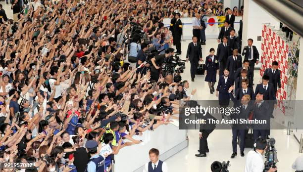Football fans welcome Japan national team arriving at Narita International Airport after the FIFA World Cup on July 5, 2018 in Narita, Chiba, Japan.