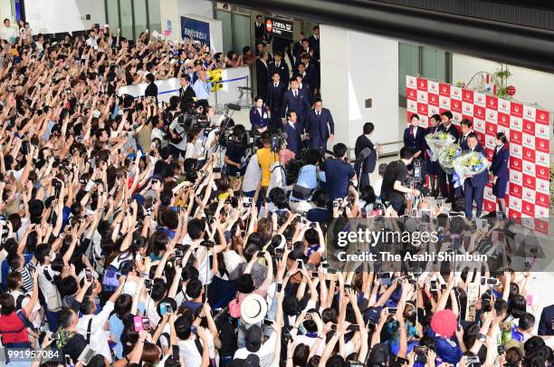 Football fans welcome Japan national team arriving at Narita International Airport after the FIFA World Cup on July 5, 2018 in Narita, Chiba, Japan.