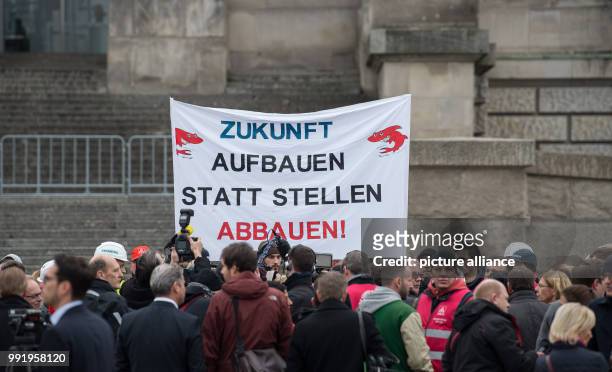 Siemens employees demonstrate during a meeting with the chairman of Germany's Social Democratic Party Schulz and the SPD faction leader in the...