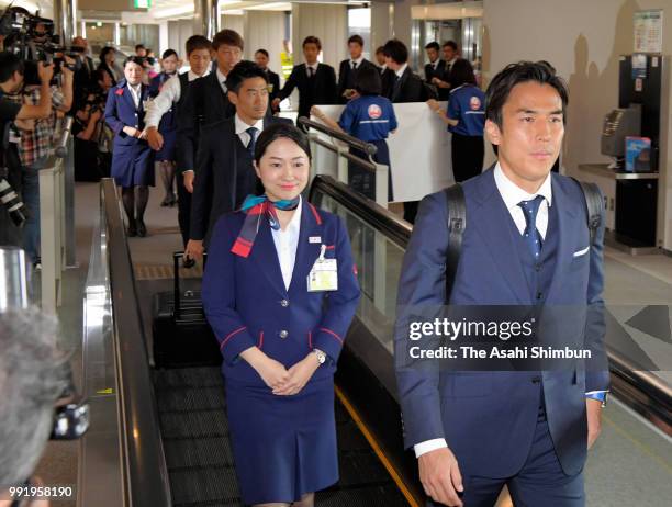 Makoto Hasebe of Japan smiles on arrival at Narita International Airport after the FIFA World Cup on July 5, 2018 in Narita, Chiba, Japan.