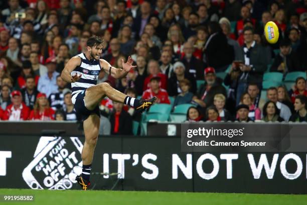 Tom Hawkins of the Cats kicks a goal during the round 16 AFL match between the Sydney Swans and the Geelong Cats at Sydney Cricket Ground on July 5,...